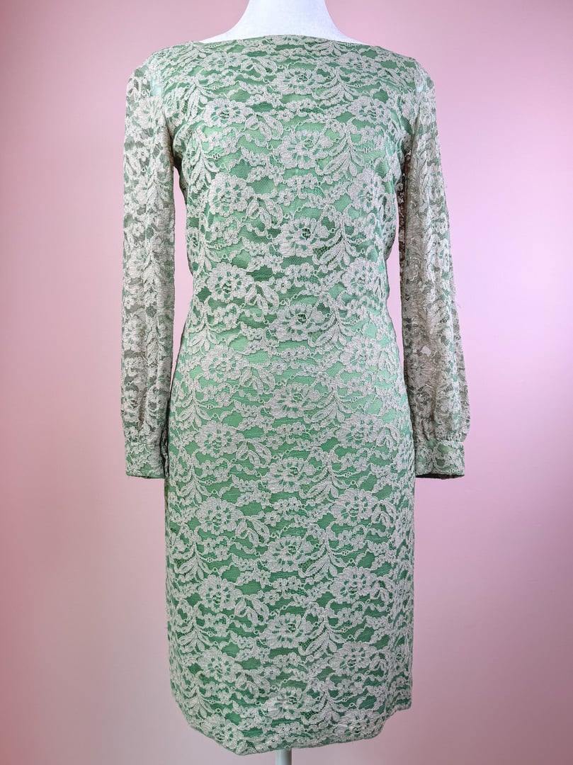 Seafoam green 1960s women's dress featuring a floral lace pattern and long sleeves.
