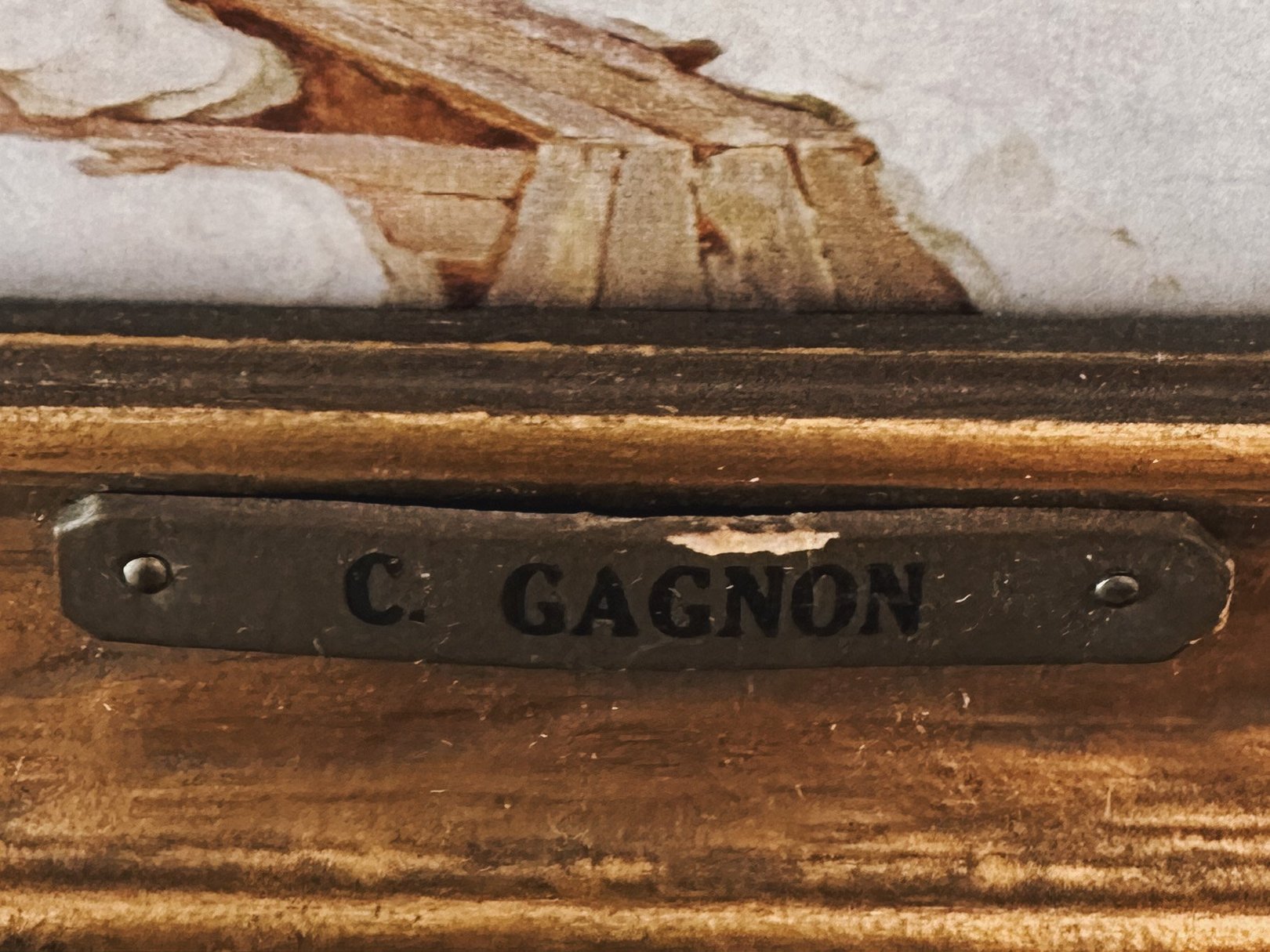 Art piece titled "Village in the Laurentian Mountains" by C. Gagnon, featuring natural scenery and earthy colors.