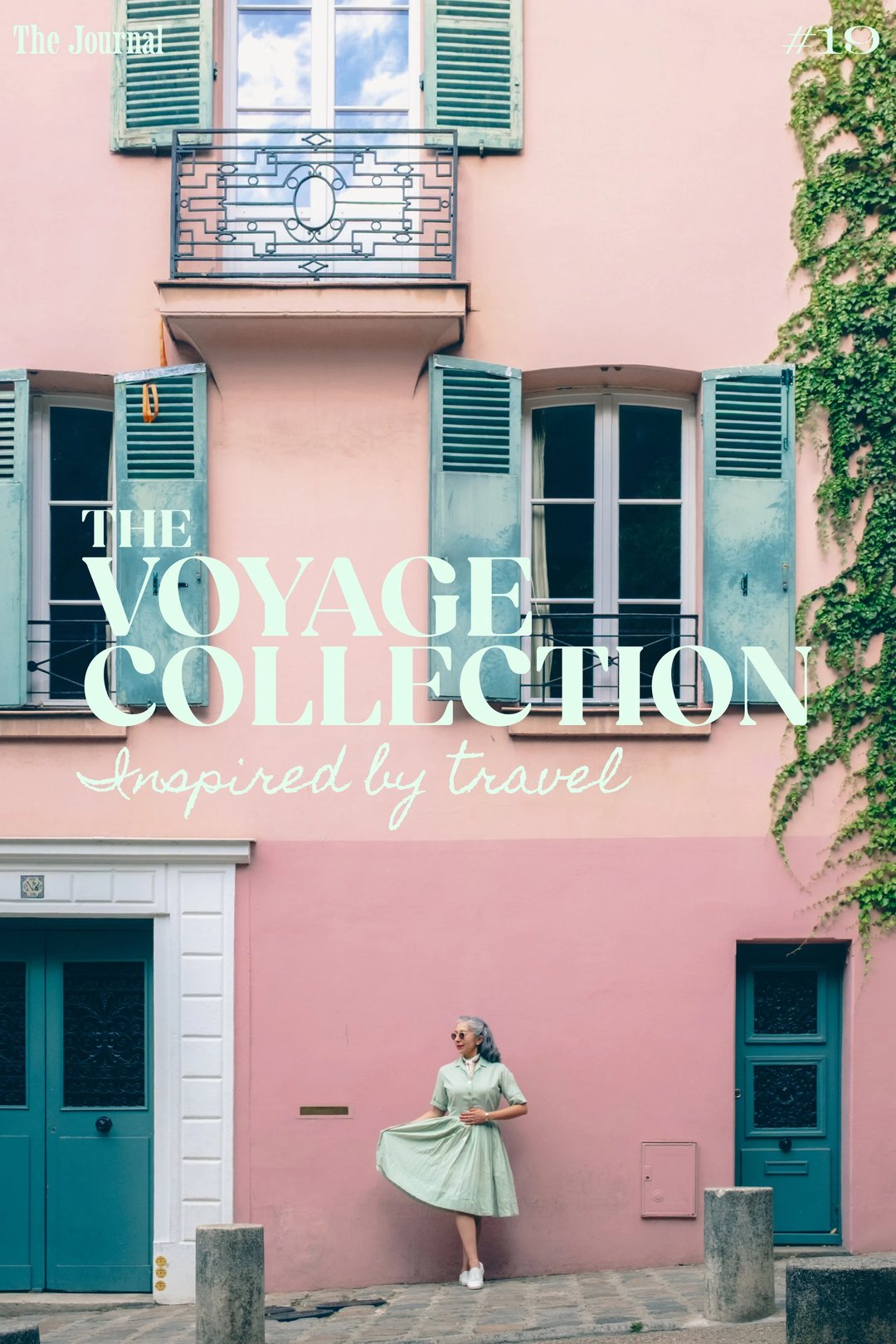 A woman in a green dress stands near a pastel-colored building adorned with shutters and greenery, promoting "The Voyage Collection" inspired by travel.