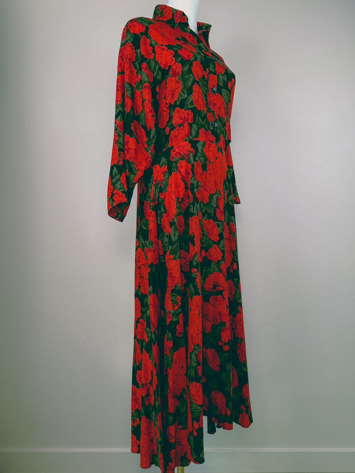 1990s women's red dress with a floral geranium pattern and long sleeves.