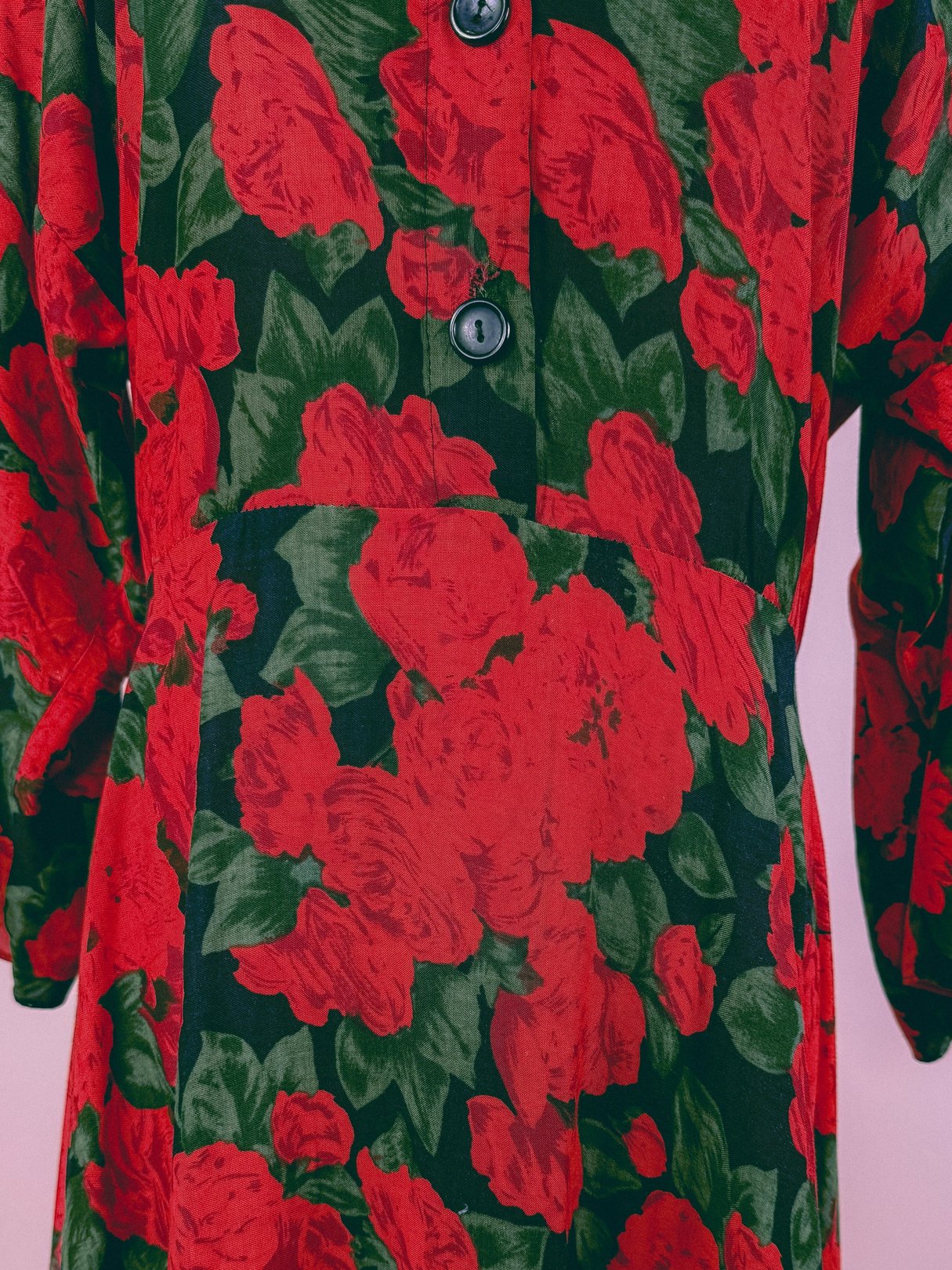 Red Geranium Bouquet Dress featuring a floral pattern and button detailing, designed for women in the 1990s.