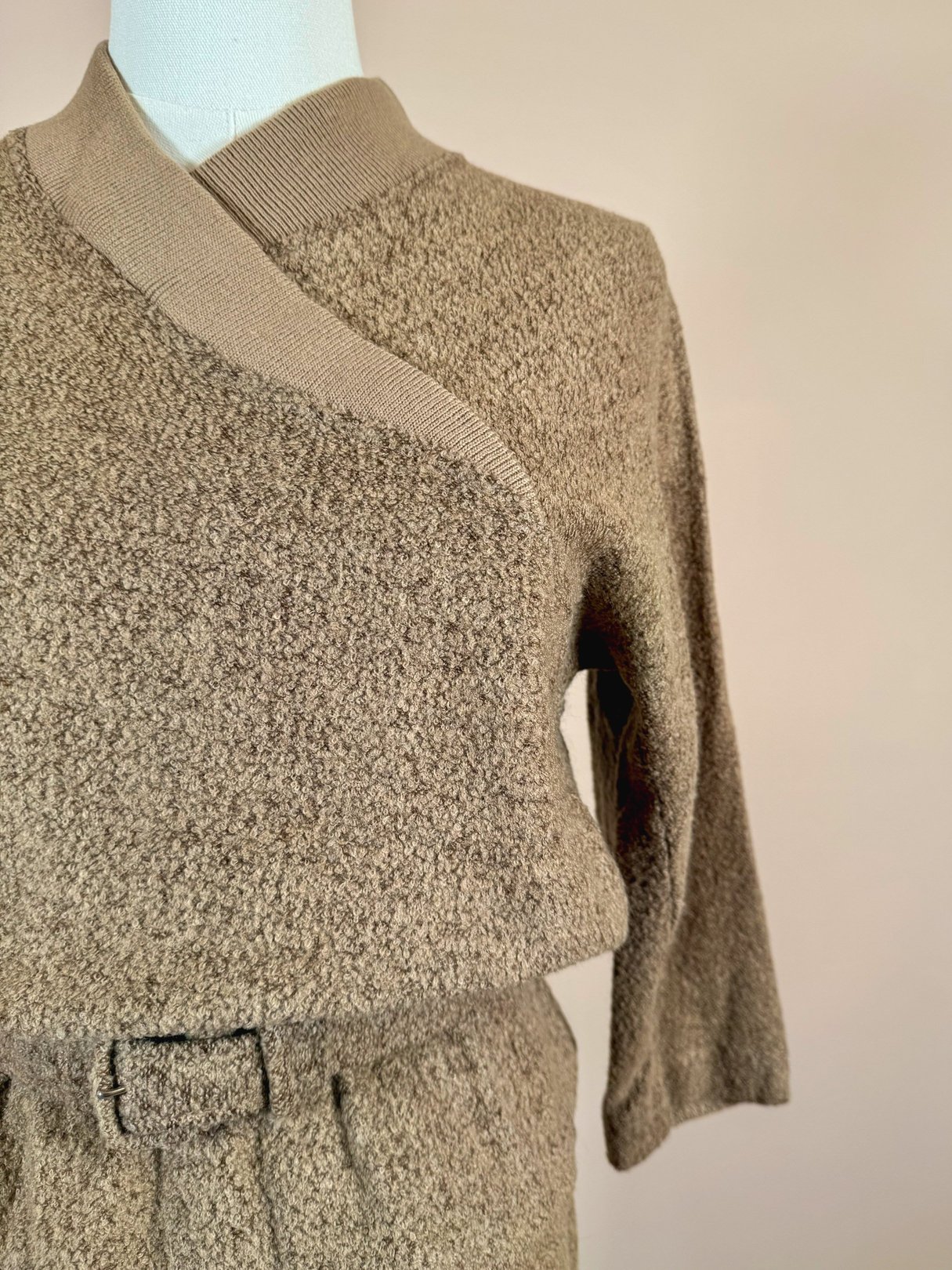 1950s women's Jantzen Hearthside knit set in tan featuring a textured fabric and a belted waist.