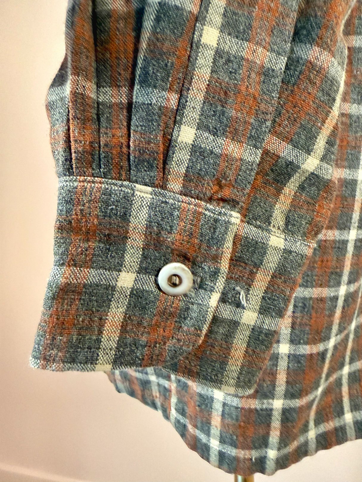 Men's 1950s Original Santa Cruzer of California plaid shirt in grey, featuring a multi-colored check pattern and a buttoned cuff.