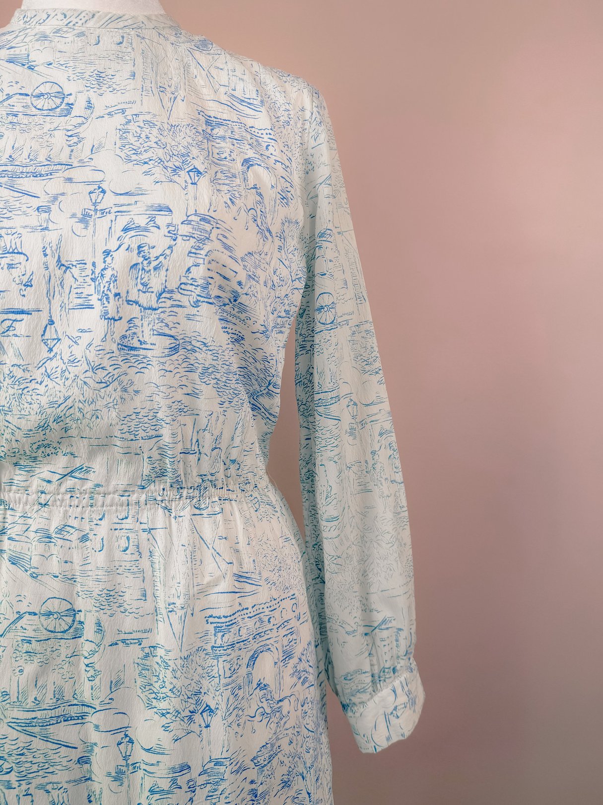 Blue 1960s women's Paris Montage Dress featuring a patterned design and an elastic waist.