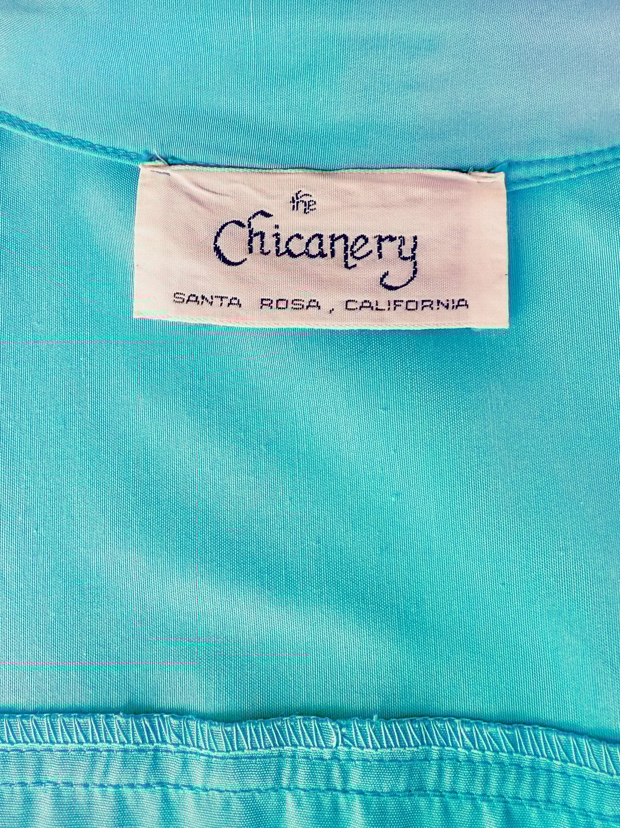 Skyline Shift Dress in sky blue, featuring a label from Chicanery, Santa Rosa, California.