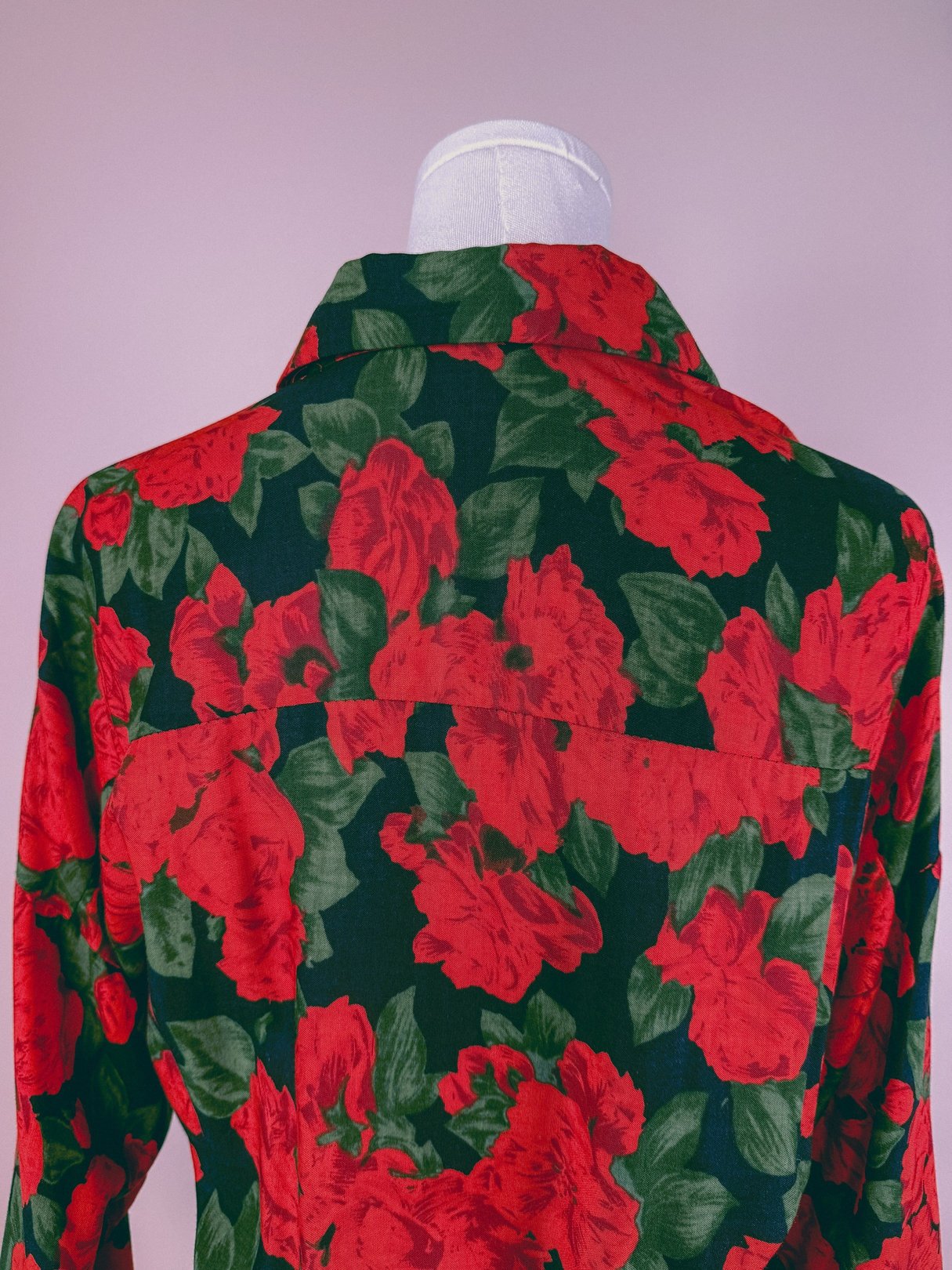 1990s red Geranium Bouquet dress featuring a floral pattern with large red flowers and green leaves, shown from the back.