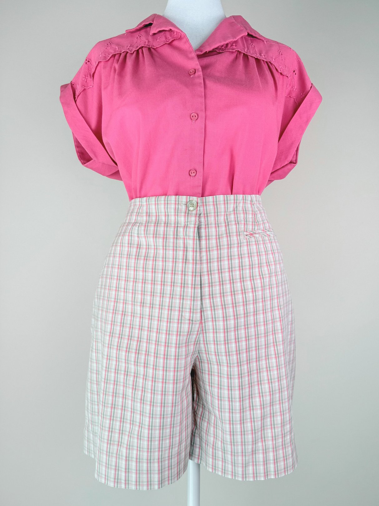 Pink 1980s women's Sugar Plaid Shorts featuring a high waist and a checkered pattern.