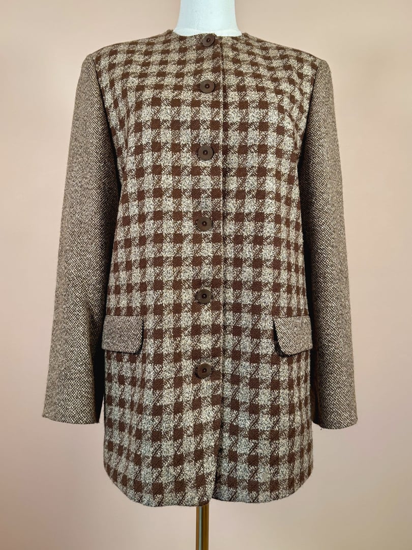 Brown tweed coat featuring a check pattern, round neckline, button front, and side pockets, designed for women, from the 1990s.