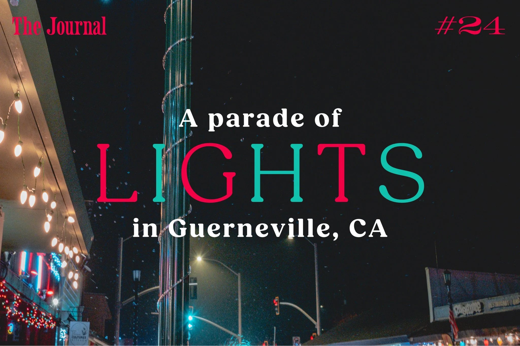A nighttime scene of a parade featuring colorful lights in Guerneville, CA, with festive decorations and a tall lighted structure.