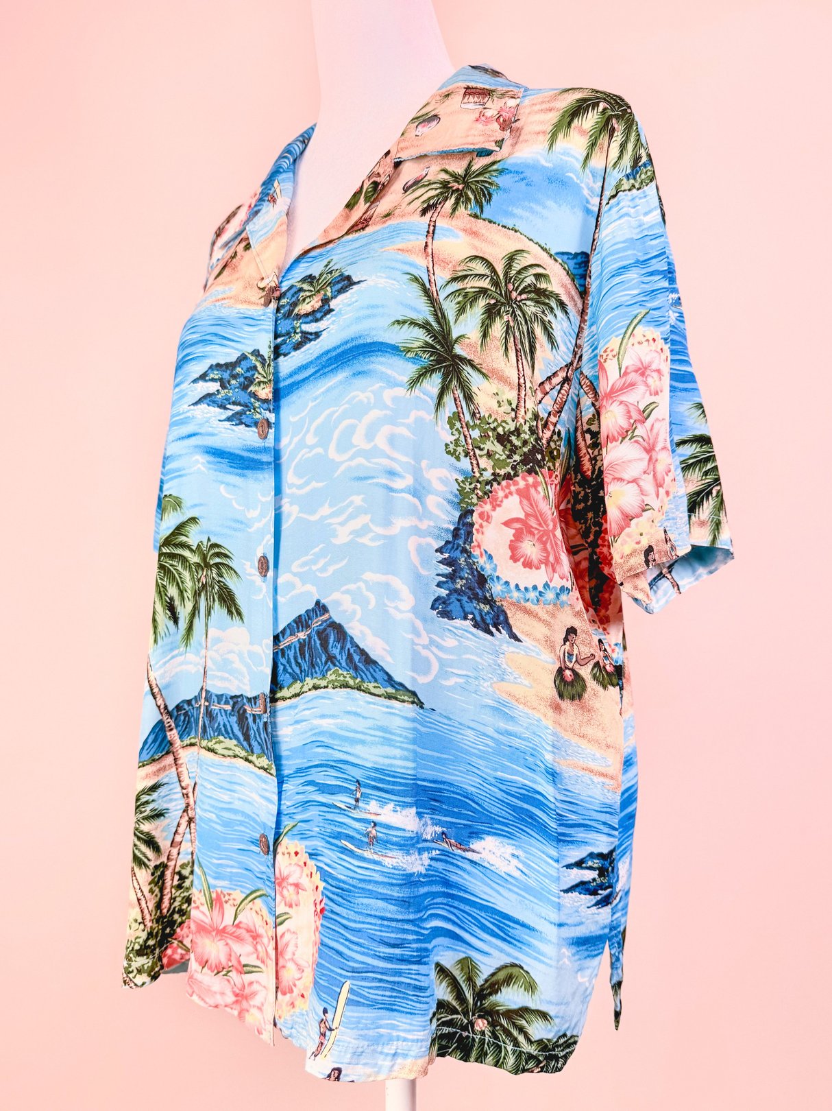 1960s women's blue tropical print Aloha Darling Top featuring palm trees and ocean scenery.