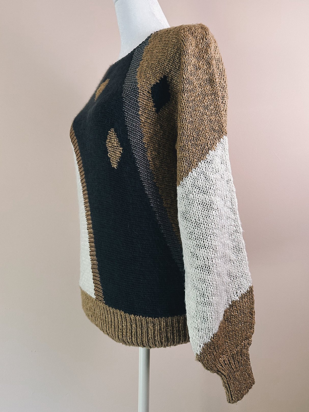 Women's 1980s blue Abstract Diamond Flagstaff Sweater featuring a geometric pattern in brown and white, displayed on a mannequin.