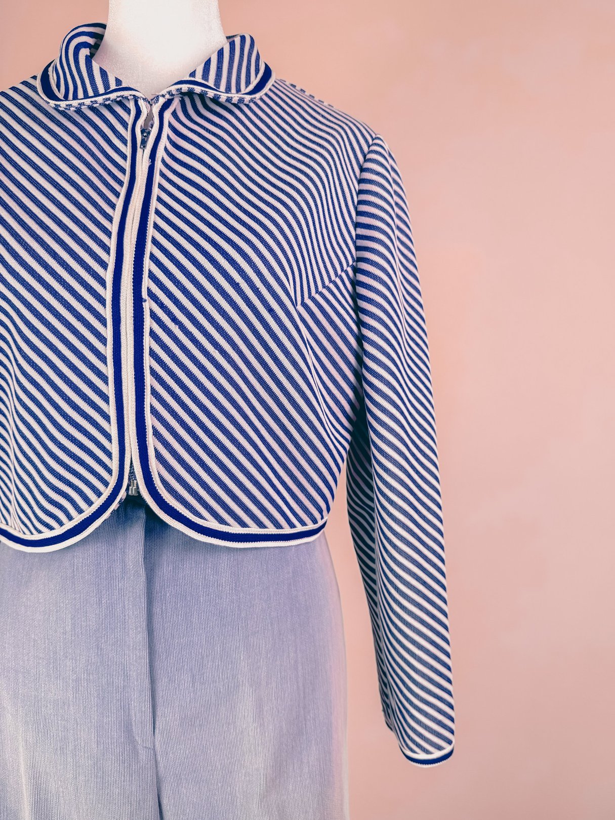 Navy blue 1960s women's Rue de Swing jacket featuring a striped pattern and cropped design.