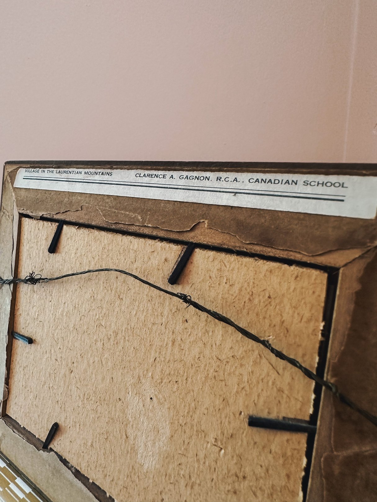 Framed artwork titled "Village in the Laurentian Mountains" by C. Gagnon, showcasing a 1970s aesthetic, intended for home decor.