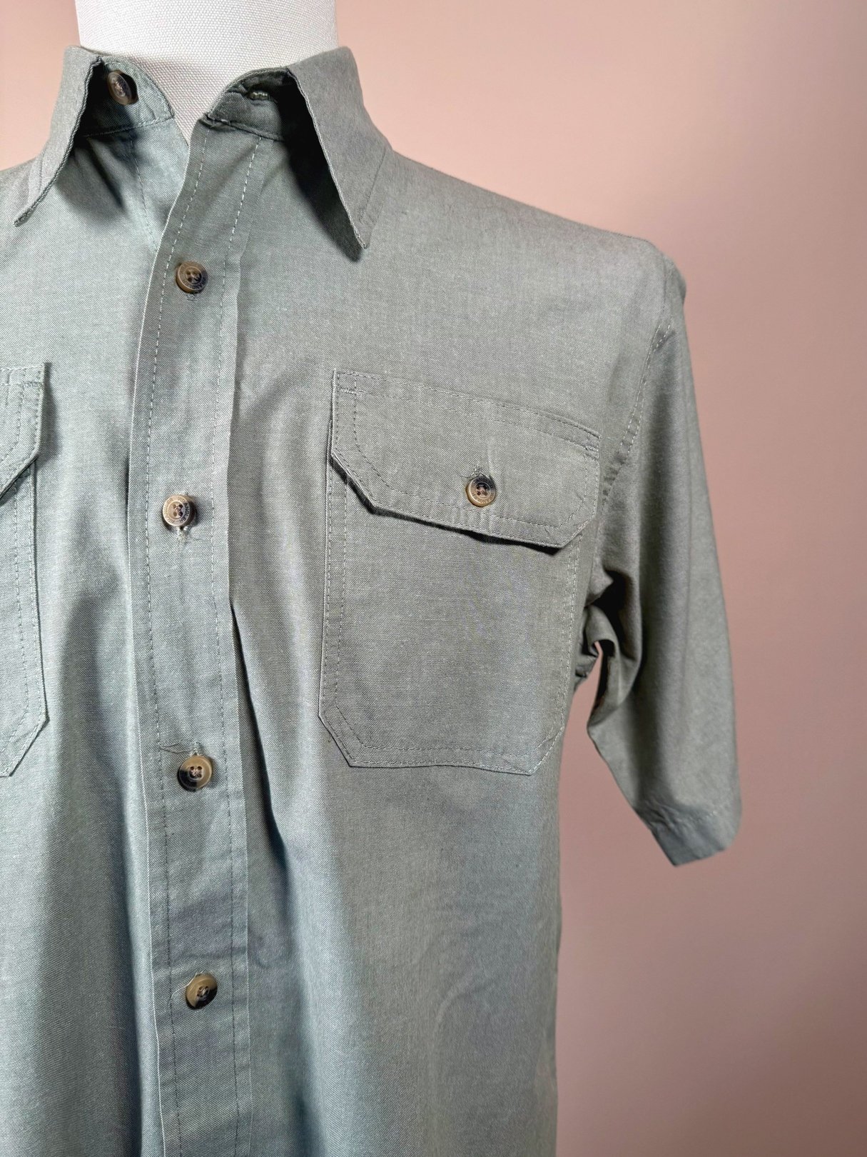 Men's 1990s Wrangler Authentics camp shirt in sage green featuring short sleeves and two chest pockets.