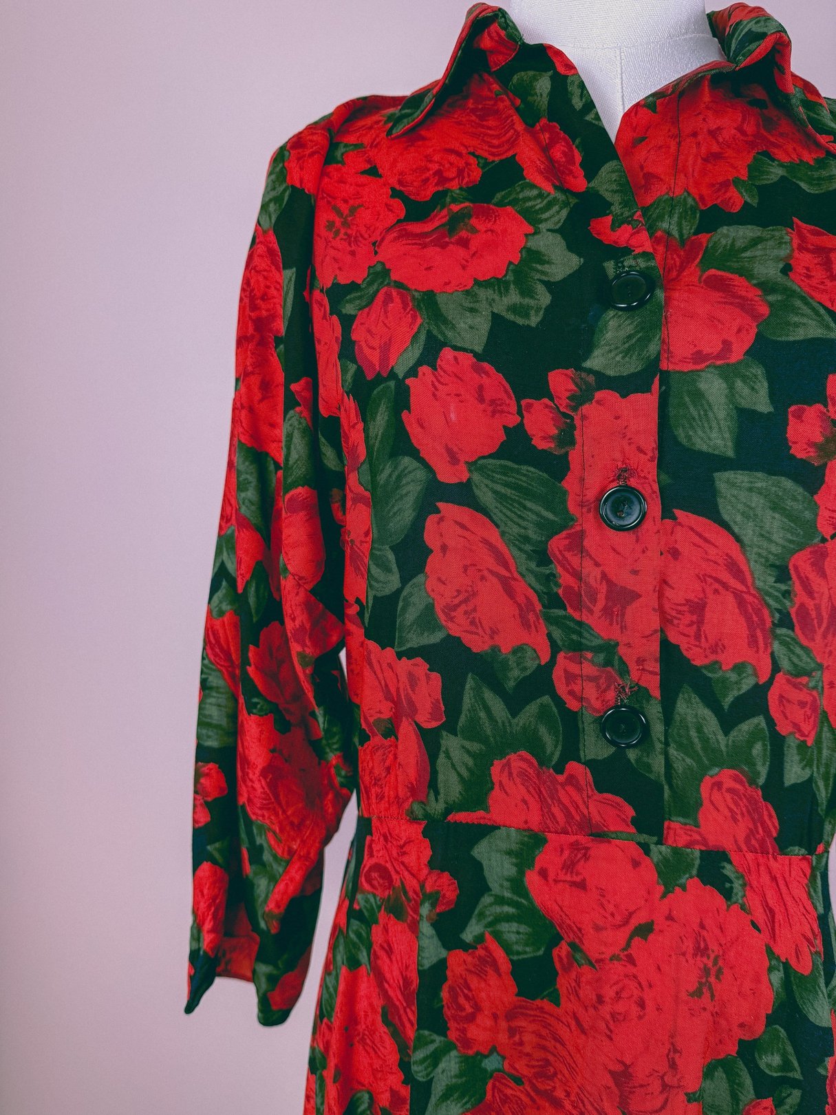 Red floral patterned dress with long sleeves and buttons, featuring a 1990s style.