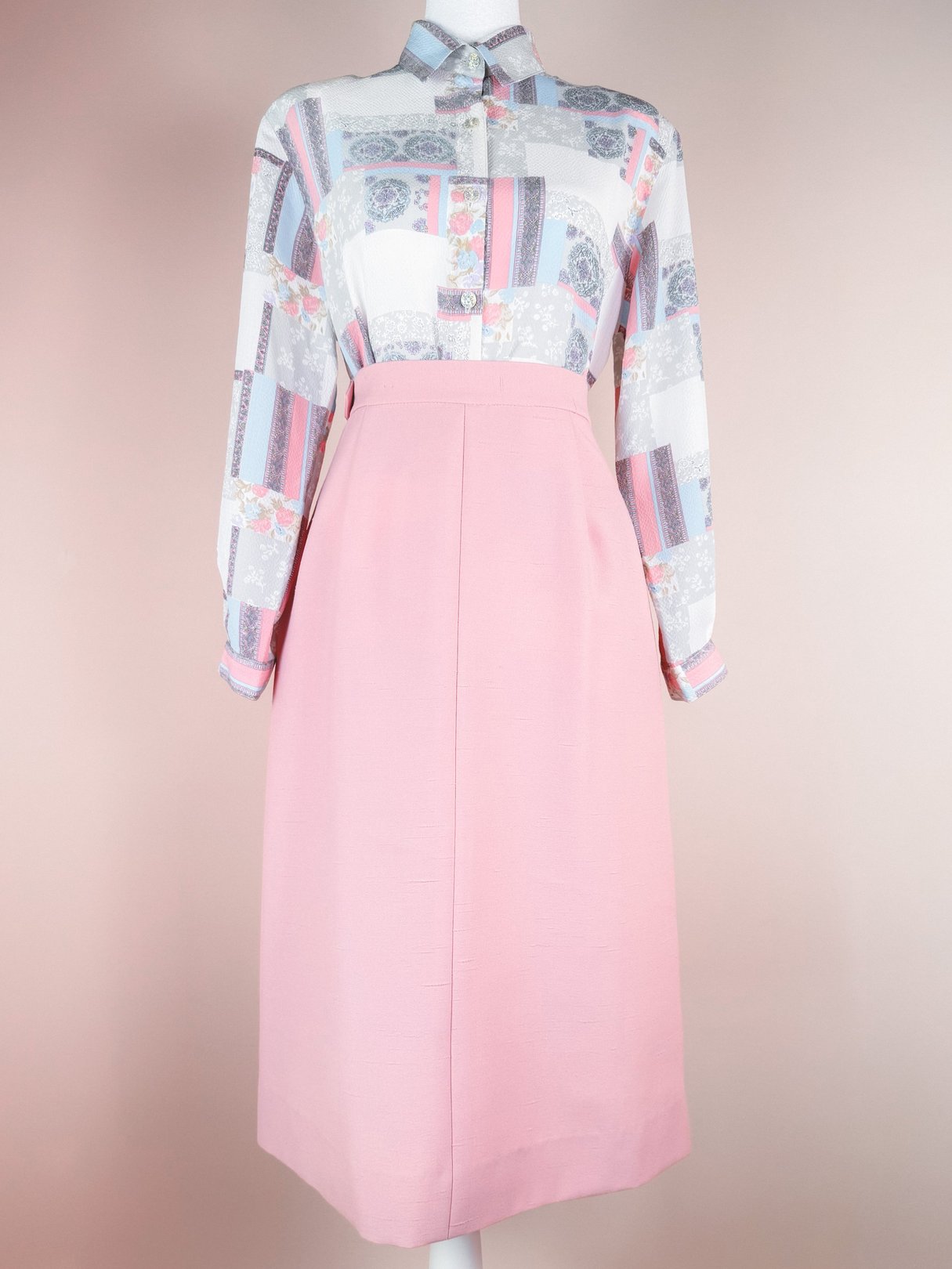 1970s women's Lilli Ann Blush Moment 3 Piece Suit featuring a patterned blouse and a solid blush pink skirt.