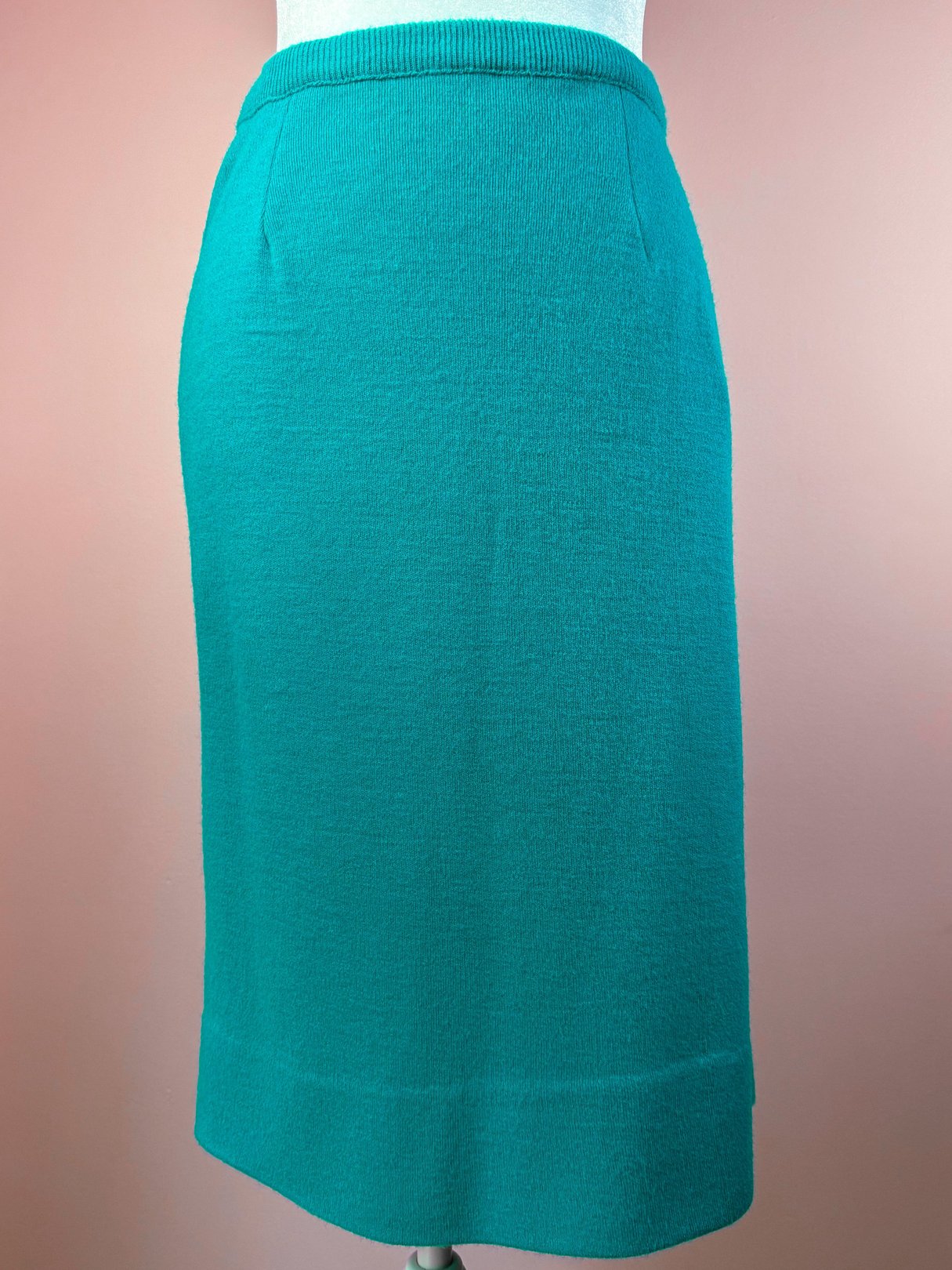 Teal green knit skirt set for women, featuring a fitted pencil skirt design from the 1960s.