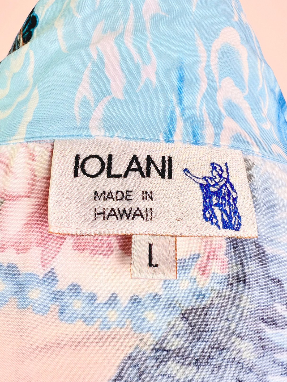 Blue 1960s women's Aloha Darling Top with IOLANI label made in Hawaii.
