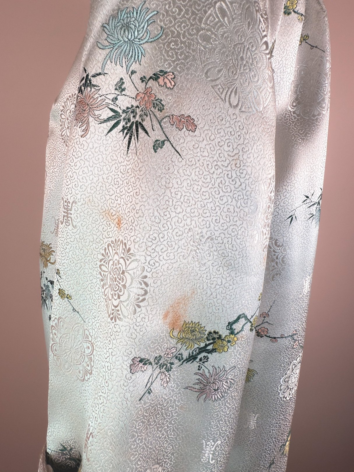 Silver 1970s women's Harmony Silk Cheongsam Coat featuring intricate floral patterns.