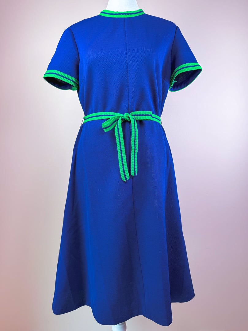 1970s women's Pacific Lines Dress in blue with green trim and a matching belt.