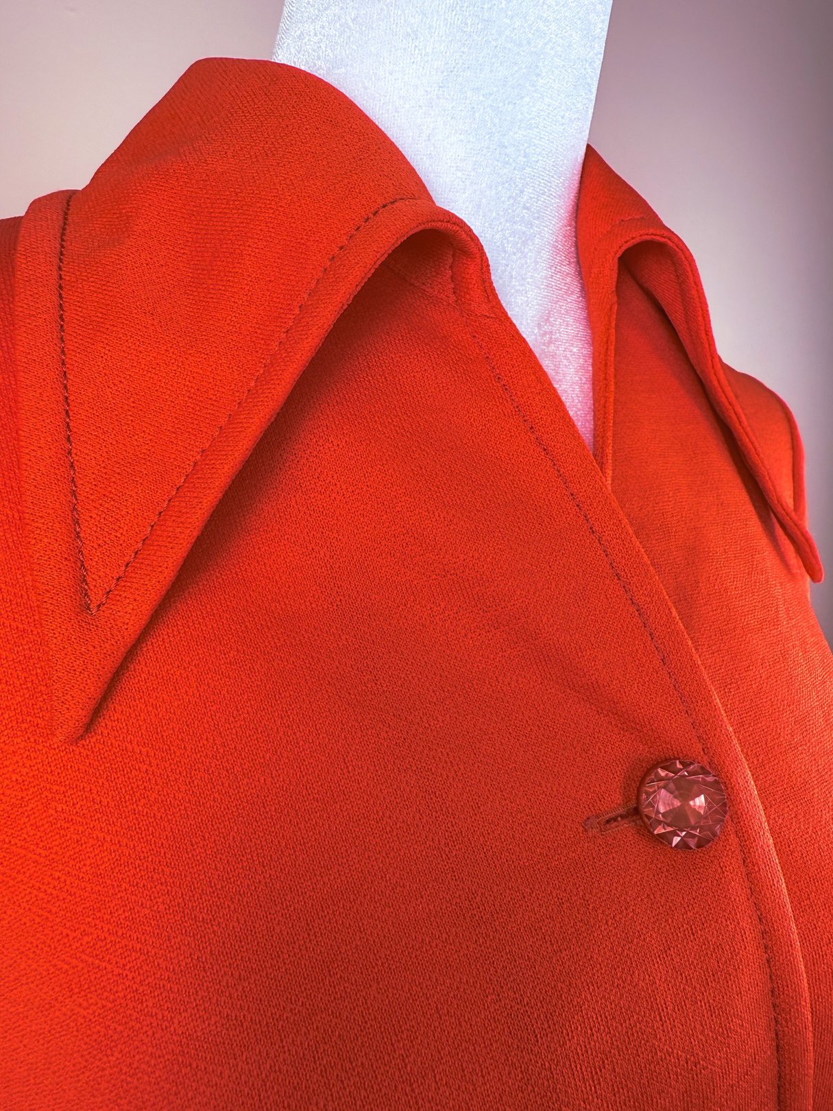 Red Cherry Lace Bell Dress featuring a collar and decorative button, indicative of 1970s fashion for women.