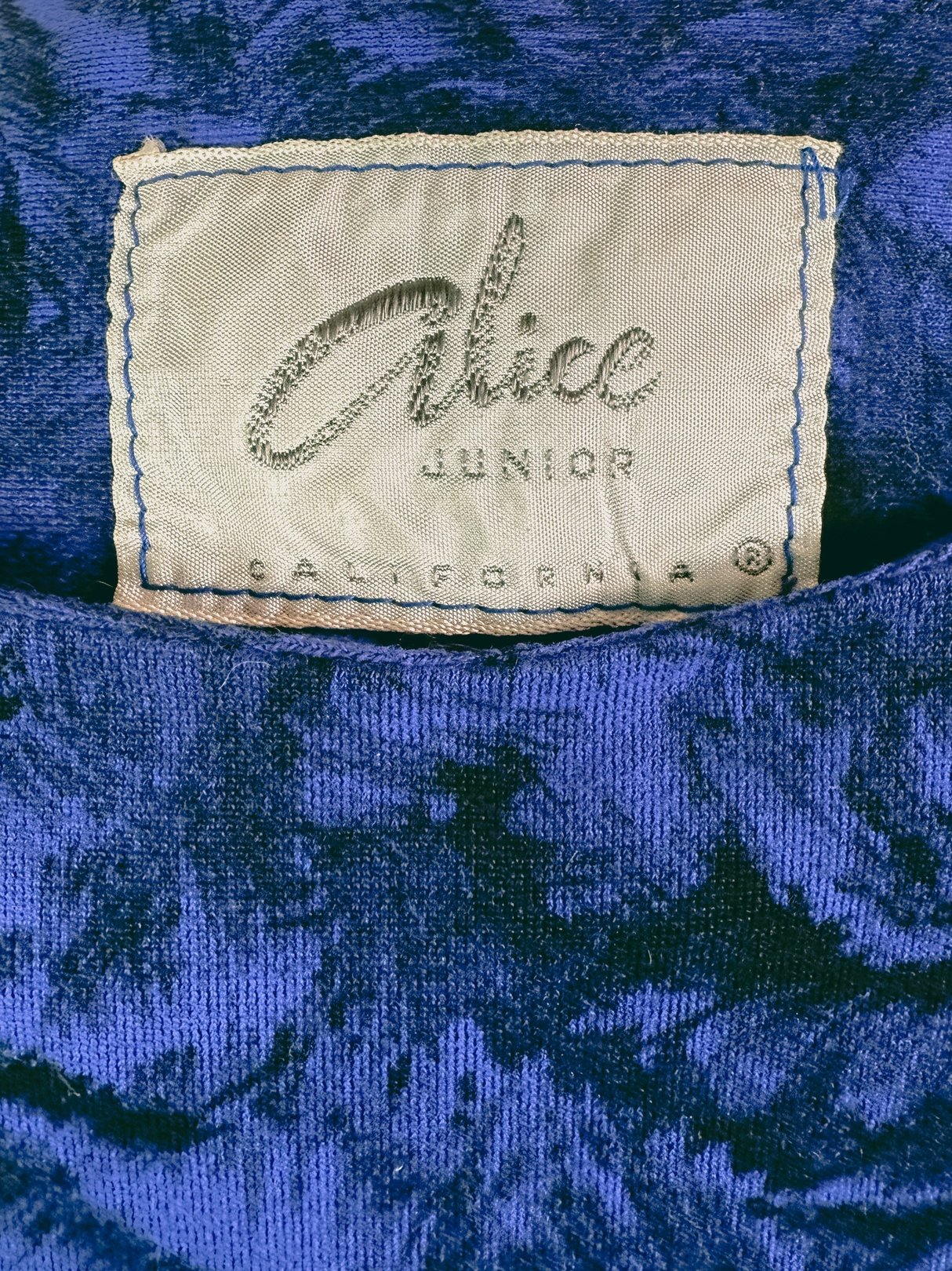 Midnight blue velvet dress from the 1960s with a label reading "Alice Junior.