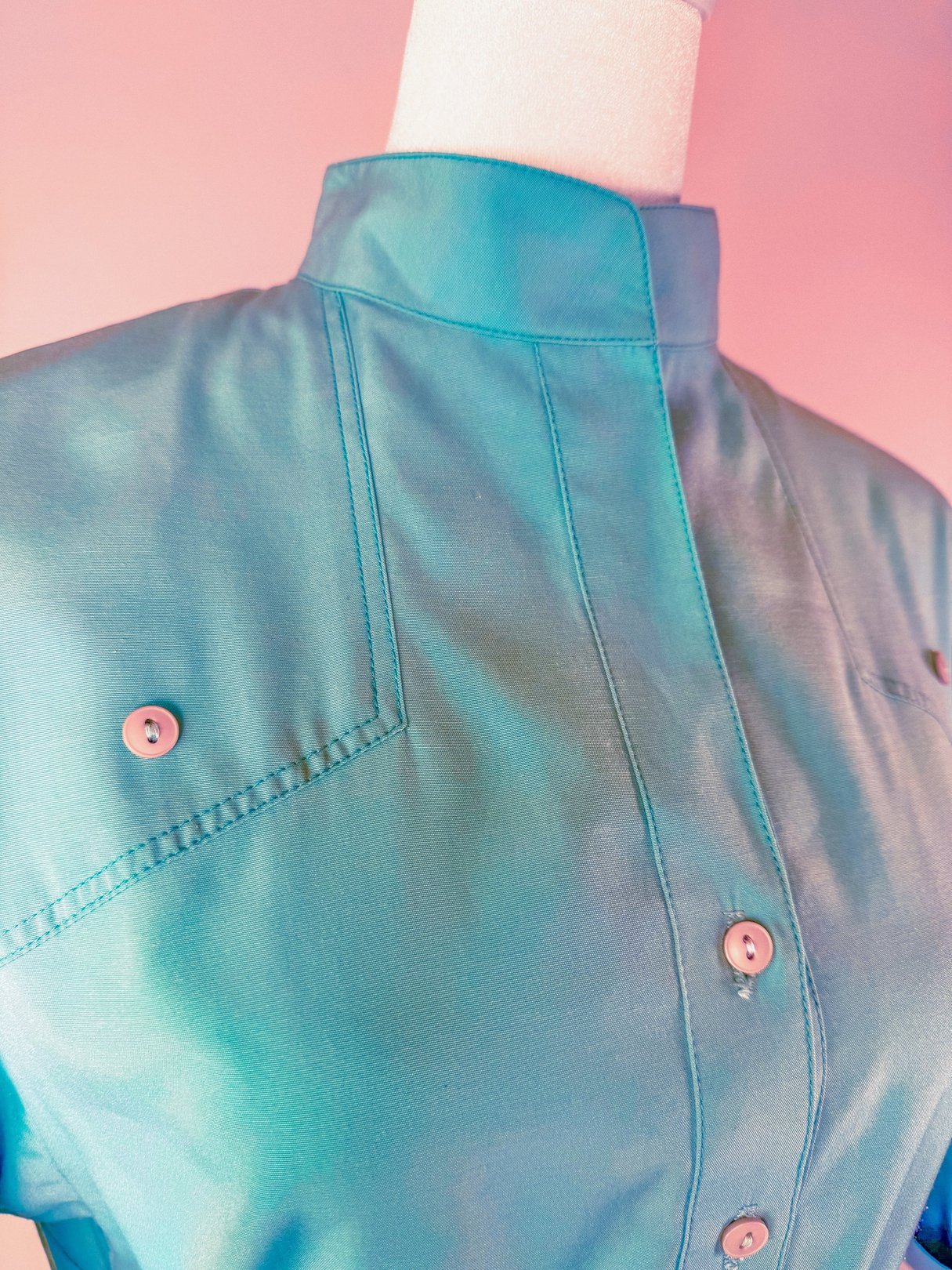 Skyline Shift Dress featuring a sky blue hue, 1960s style, and a collar with button details.