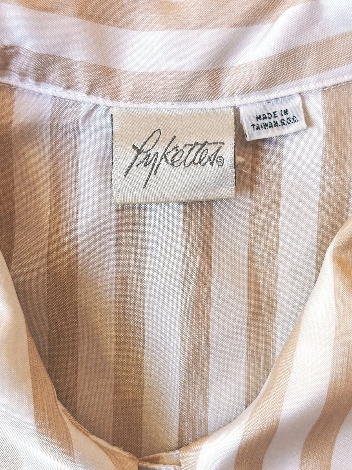 Classic 1970s white blouse with tan and blush stripes, featuring a label that reads "Lynett's, Made in Taiwan, R.O.C.