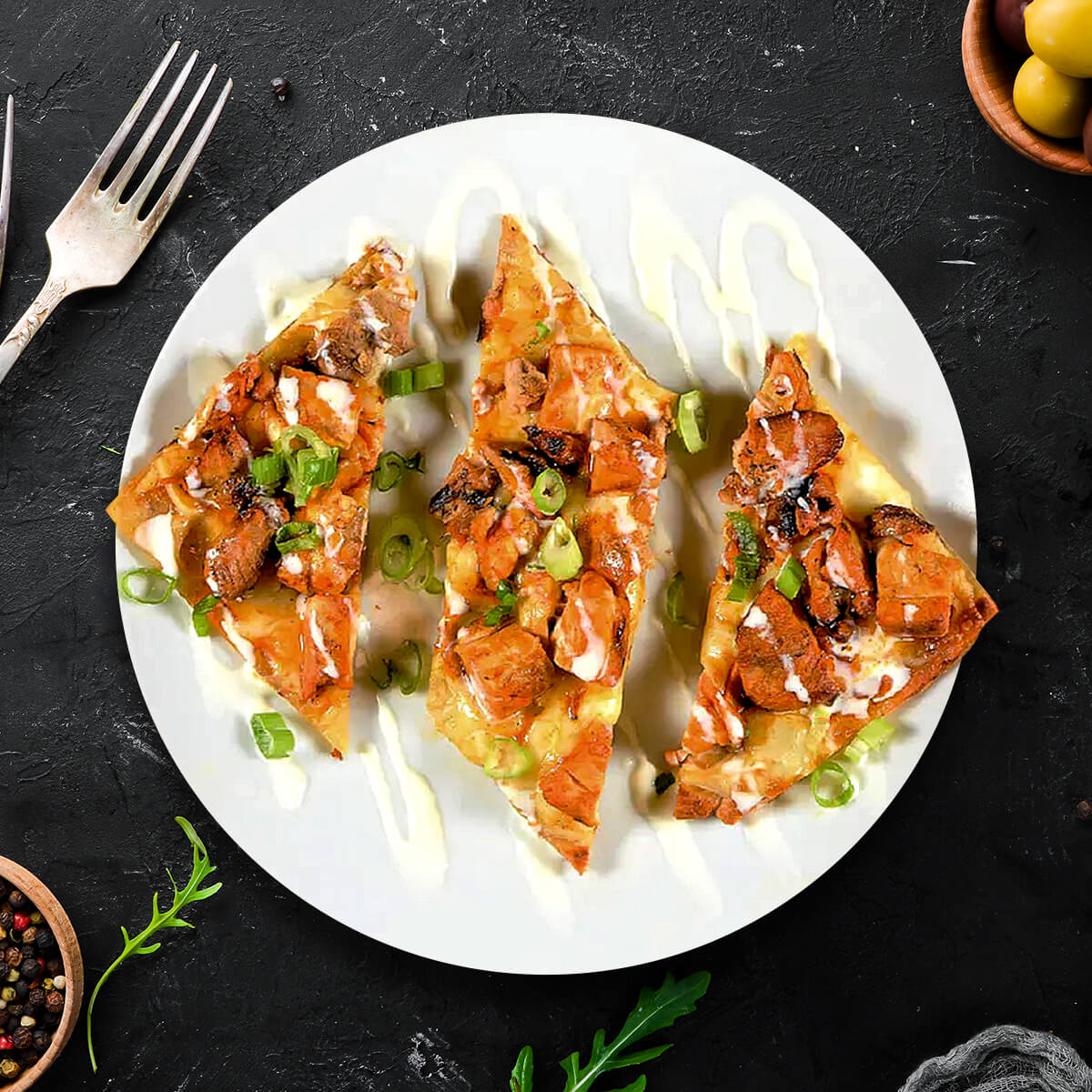A crispy New York-style flatbread topped with tender shredded chicken tossed in a bold cayenne buffalo sauce, and blanketed with creamy, melted mozzarella.