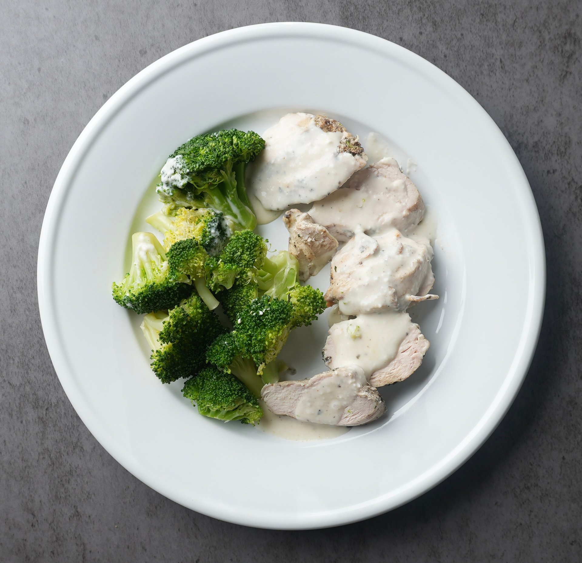 Experience a taste of home with our artisanal Chicken Broccoli Alfredo.