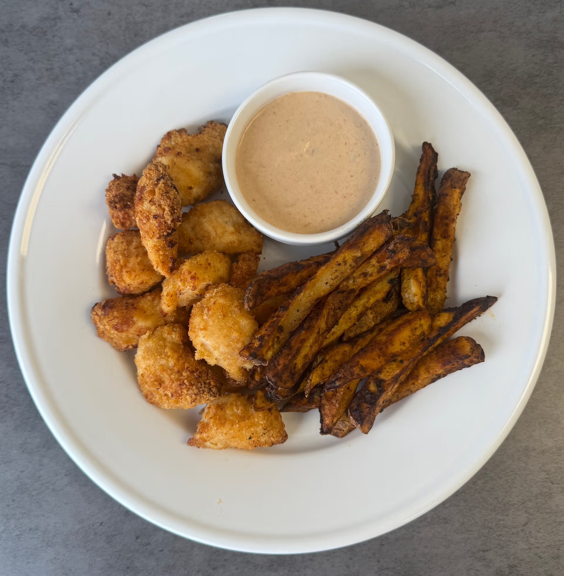 Macros include portioned sauce cup. WOW/WOW Sauce Cup: Calories: 124, Fat: 11g, Carbs: 6g, Protein: 2g, Sodium: 285mg