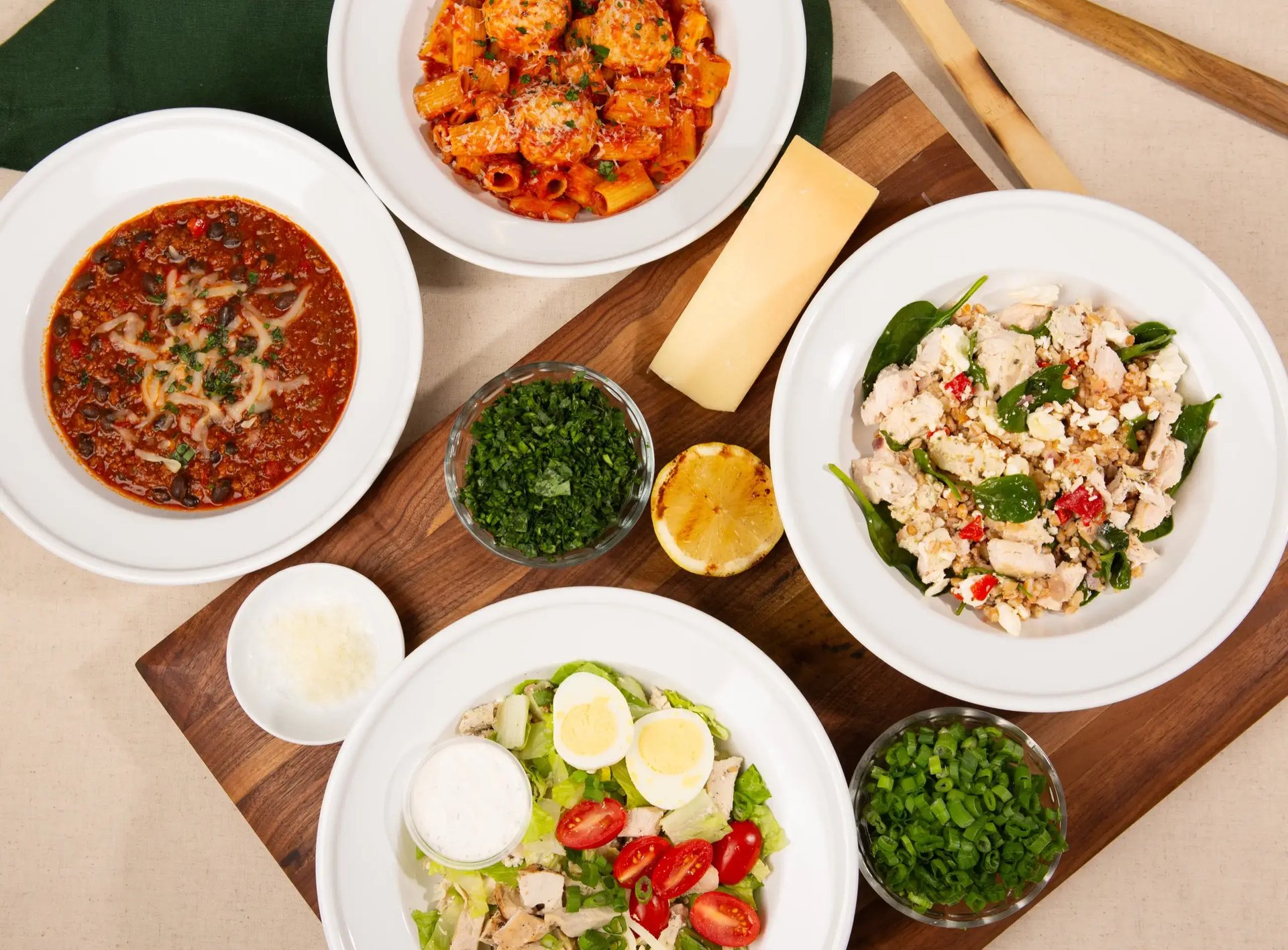 Four fresh chef-crafted Nutre meal plates ready for delivery