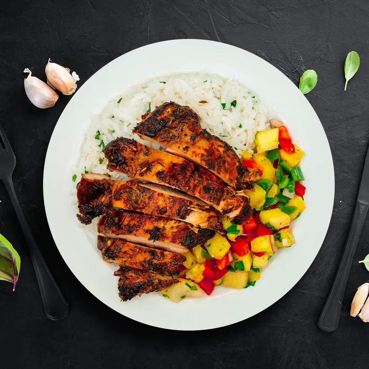 Juicy, all-natural chicken thighs marinated in a bold jerk seasoning with fresh ginger, garlic, jalapeño, coconut aminos, and a squeeze of lime delivering smoky, spicy, and deeply aromatic flavor in every bite.