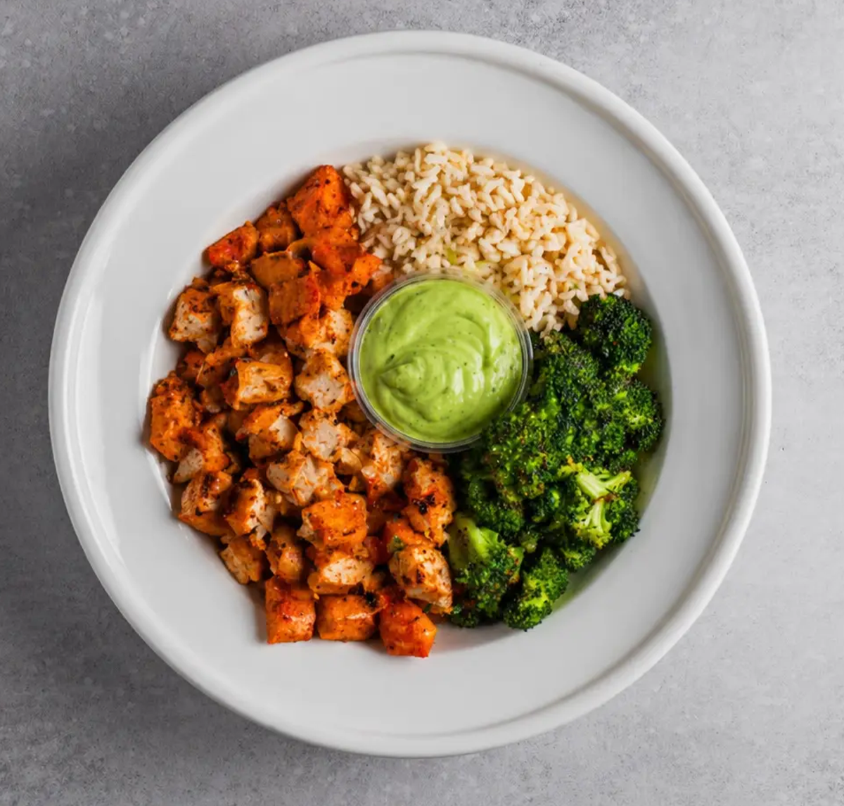 Macros include portioned sauce cup. Avocado Lime Cup: Calories: 115, Fat 12g, Carbs: 3g, Protein:1g, Sodium 87mg