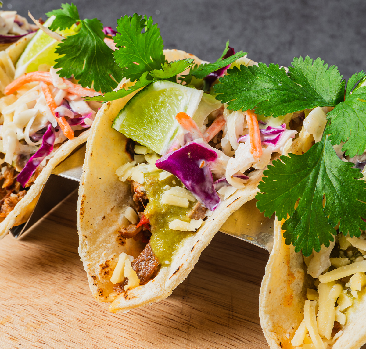 Macros include portioned sauce cup. Tomatillo Sauce Cup: Calories: 27, Fat 0g, Carbs: 2g, Protein: 0g, Sodium 141mg
