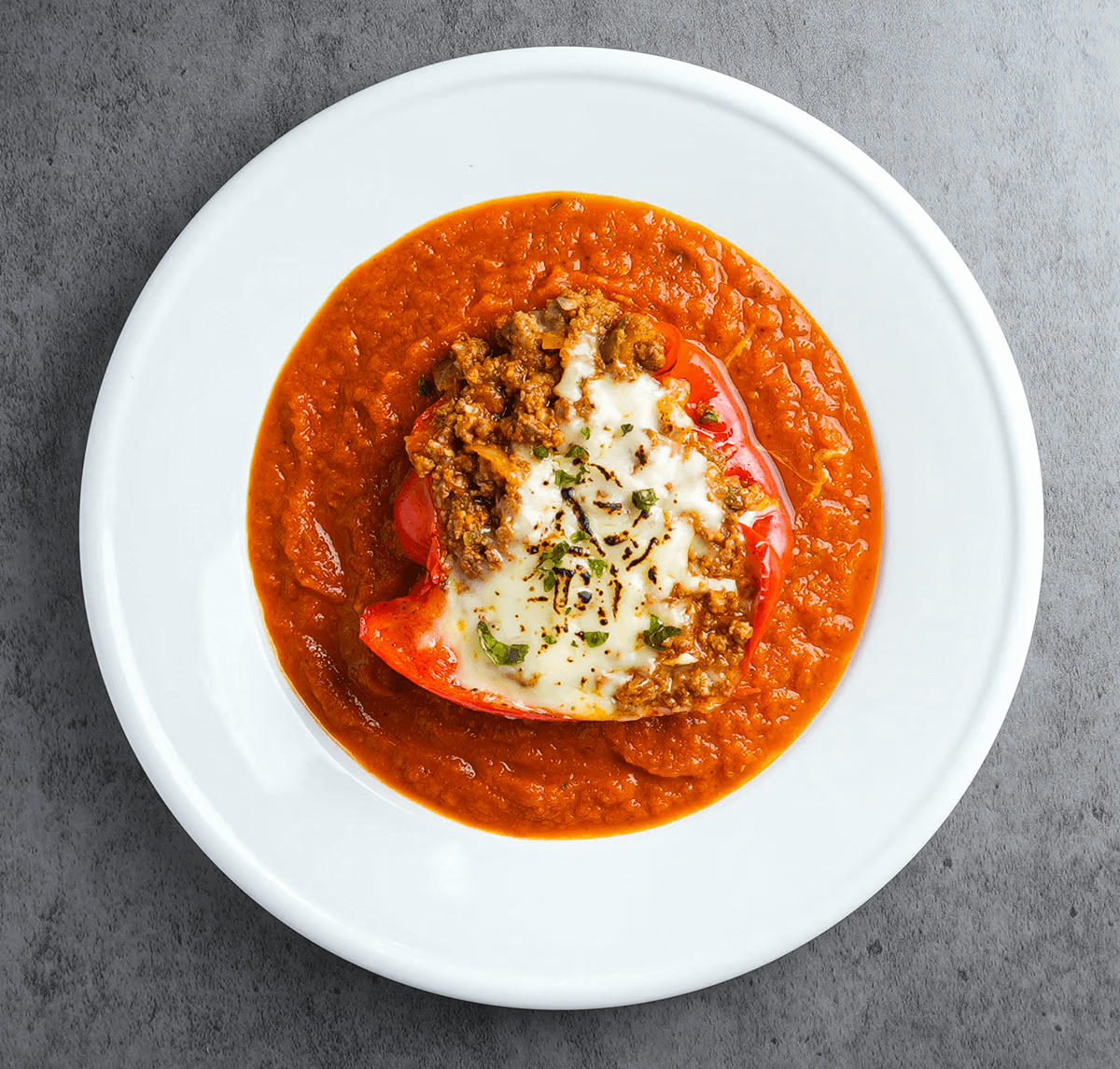 Vibrant bell peppers packed with a rich, savory-sweet sloppy joe filling seasoned Omaha sirloin ground beef slow-simmered with organic tomato purée, ketchup, Worcestershire, Dijon mustard, and a hint of pineapple juice for a perfectly tangy, smoky depth.