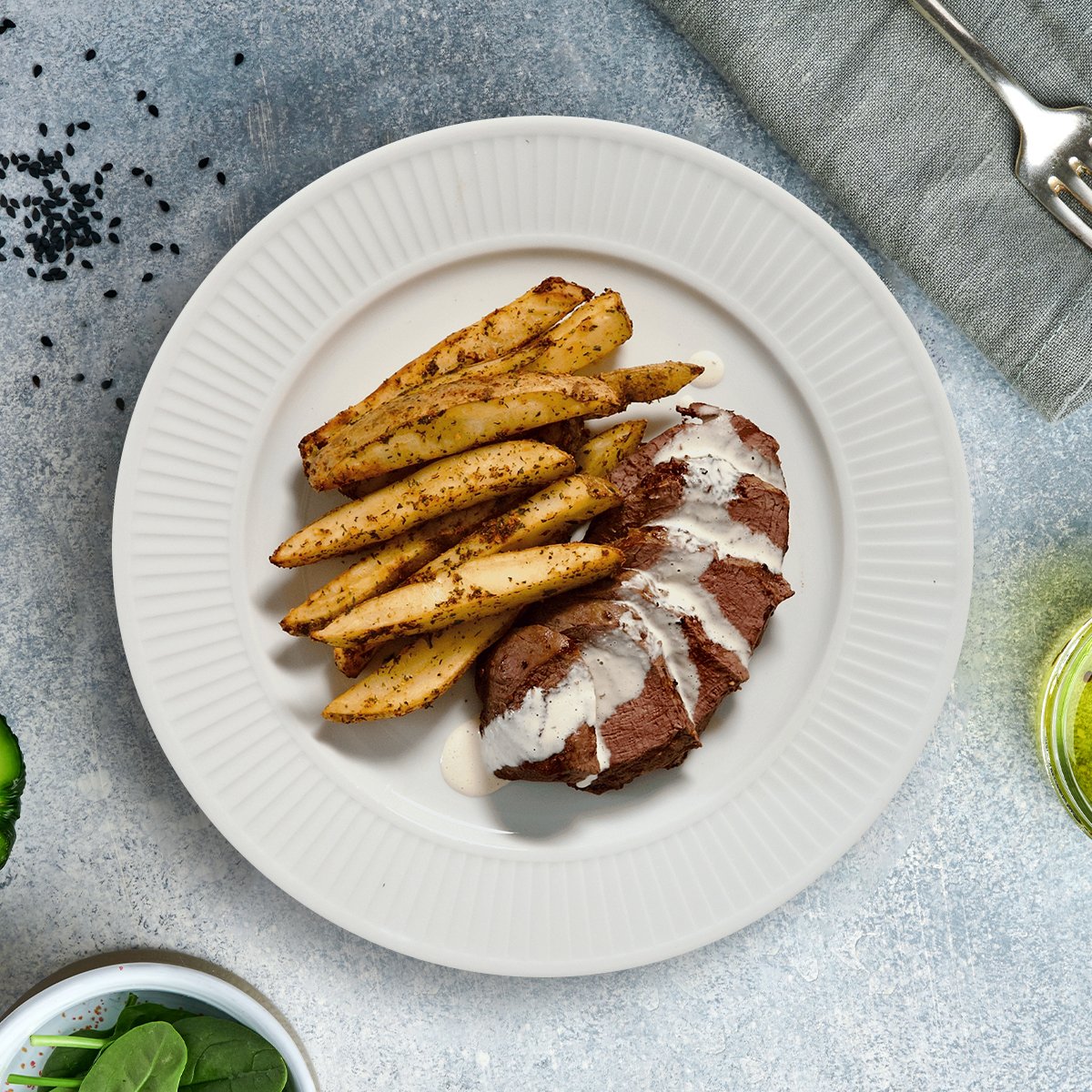 Macros include portioned sauce cup. White BBQ Sauce Cup: Calories: 200, Fat 21g, Carbs: 2g, Protein: 1g, Sodium 150mg