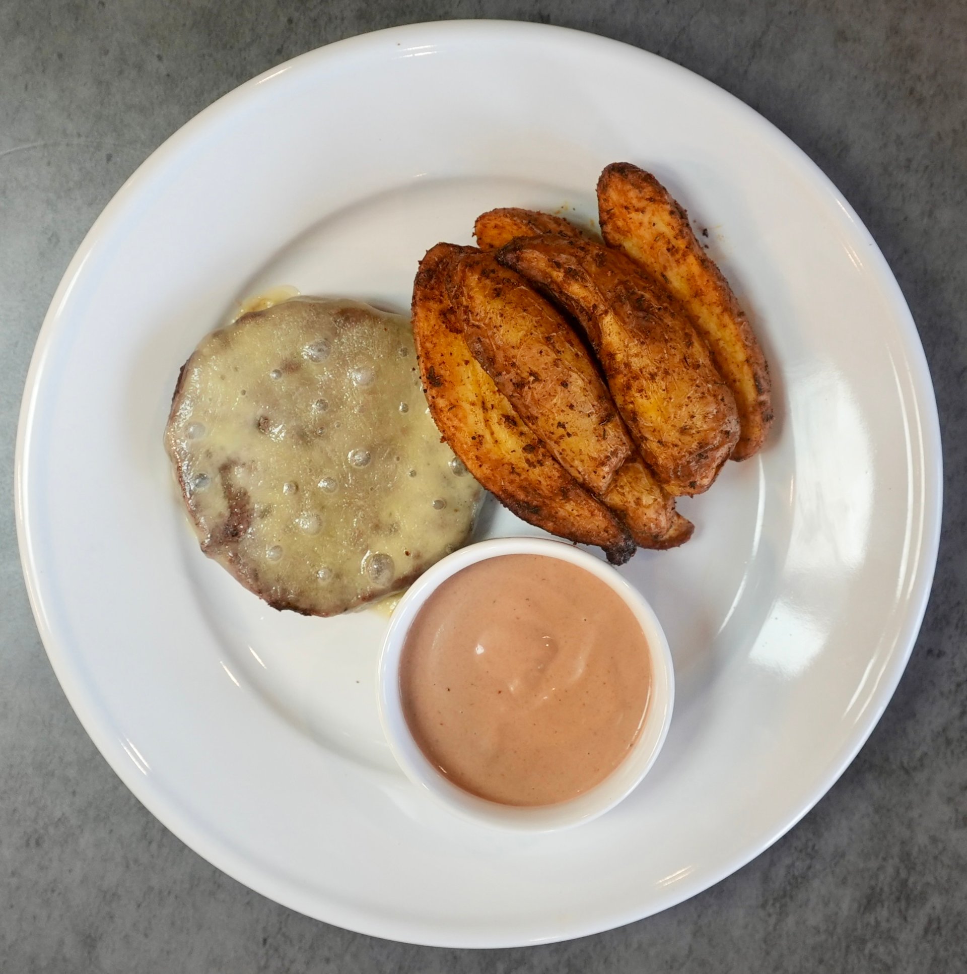 Macros include portioned sauce cup. Wow-Wow Sauce Cup: Calories: 63, Fat 5g, Carbs: 3g, Protein: 1g, Sodium 164mg