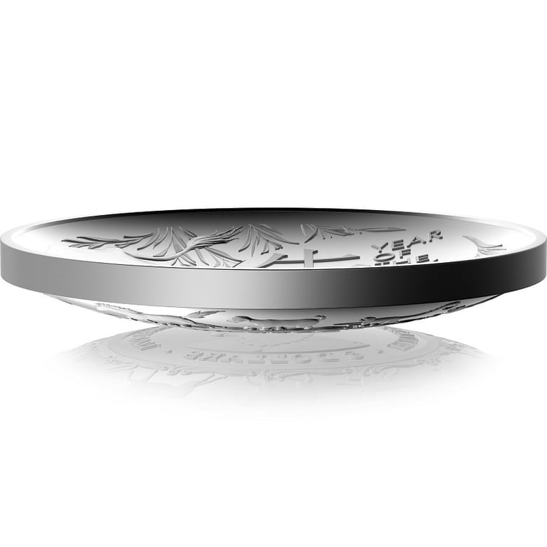 Side view of the Silver 1 oz Lunar Ox PF domed coin - RAM 2021