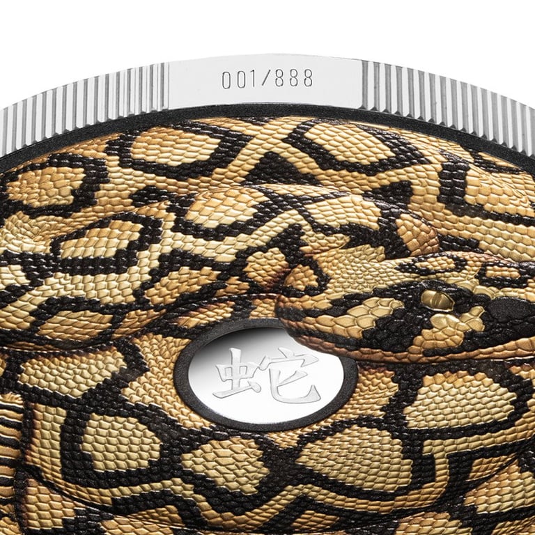 Side view of the Silver Year of the Snake - 5 oz Black Proof - Part gold plated 2025