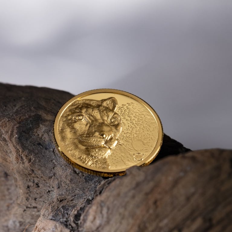 Side view of the Gold Snow Leopard 1/10 oz PF - High Relief 2024