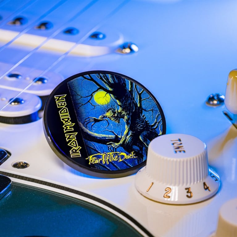 Side view of the Silver Iron Maiden - Fear of the Dark 1 oz - Obsidian Black