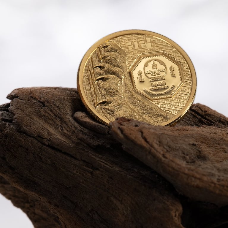 Side view of the Gold Snow Leopard 1/10 oz PF - High Relief 2024