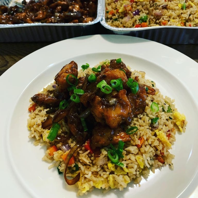 Chicken with side of rice,veg roll and soup of the day