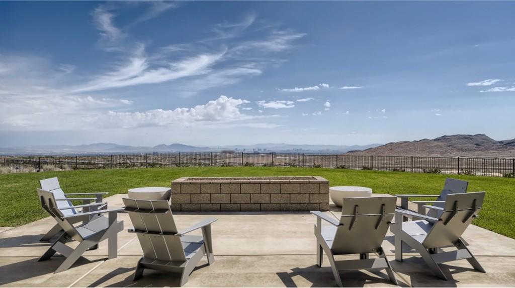Fire pit and lawn with mountain views at Heritage at Stonebridge
