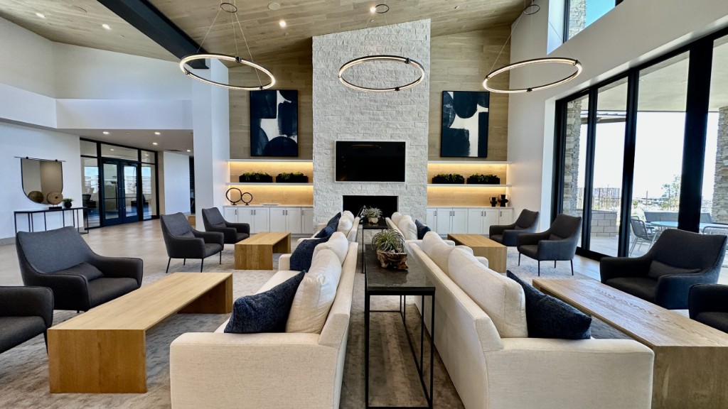 Clubhouse lounge with a fireplace at Heritage at Stonebridge