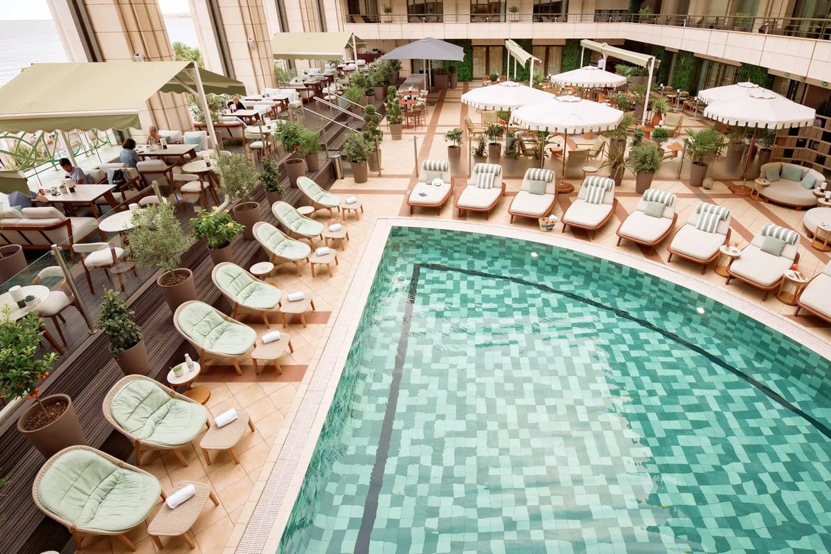 Heated indoor-outdoor pool and sun terrace at Hôtel Palais de la Méditerranée