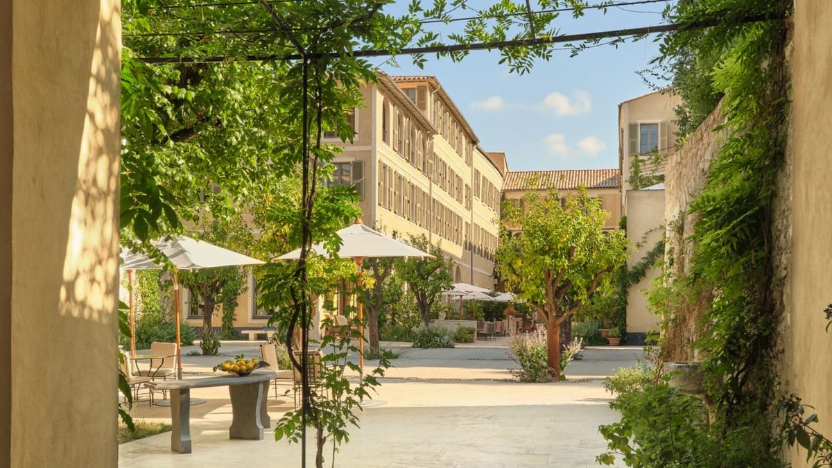Terraced gardens and Old Nice rooftops at Hôtel du Couvent