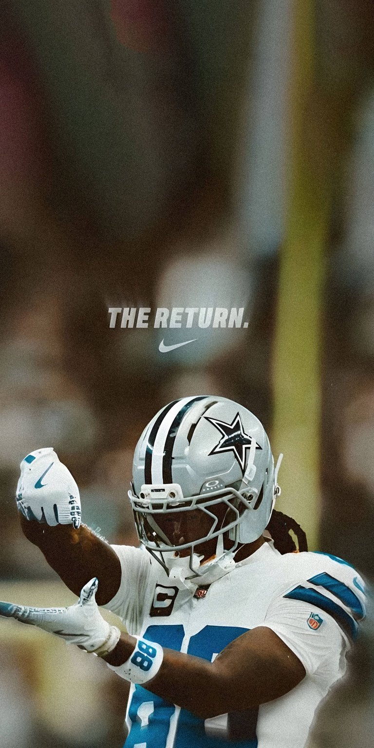 Get hyped with this CeeDee Lamb 4K wallpaper for your iPhone! The crisp wallpaper showcases Lamb in his Cowboys uniform with a silver helmet and blue and white details.