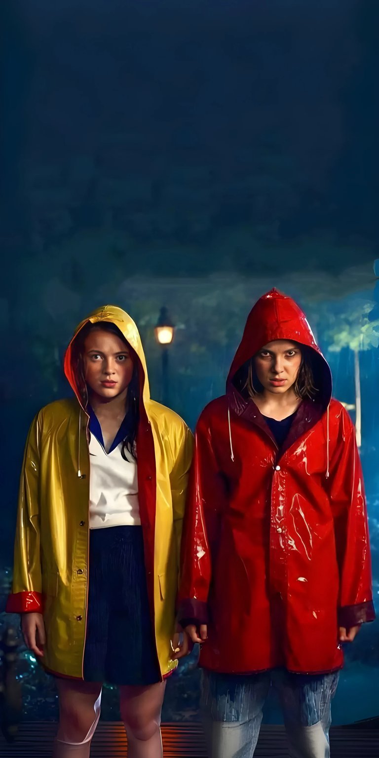 Download this captivating Eleven and Max 4K wallpaper for your iPhone, showcasing the girls in vibrant, glossy raincoats. Notice the stark contrast between Max's bright yellow coat and Eleven's deep red one, set against a backdrop with a vintage street lamp and falling rain, making this wallpaper a striking choice.